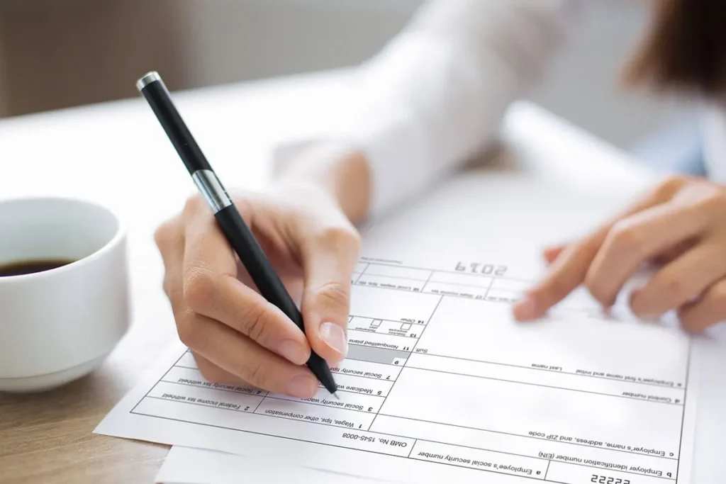 Person filling out a simple online contact form to request car insurance quotes
